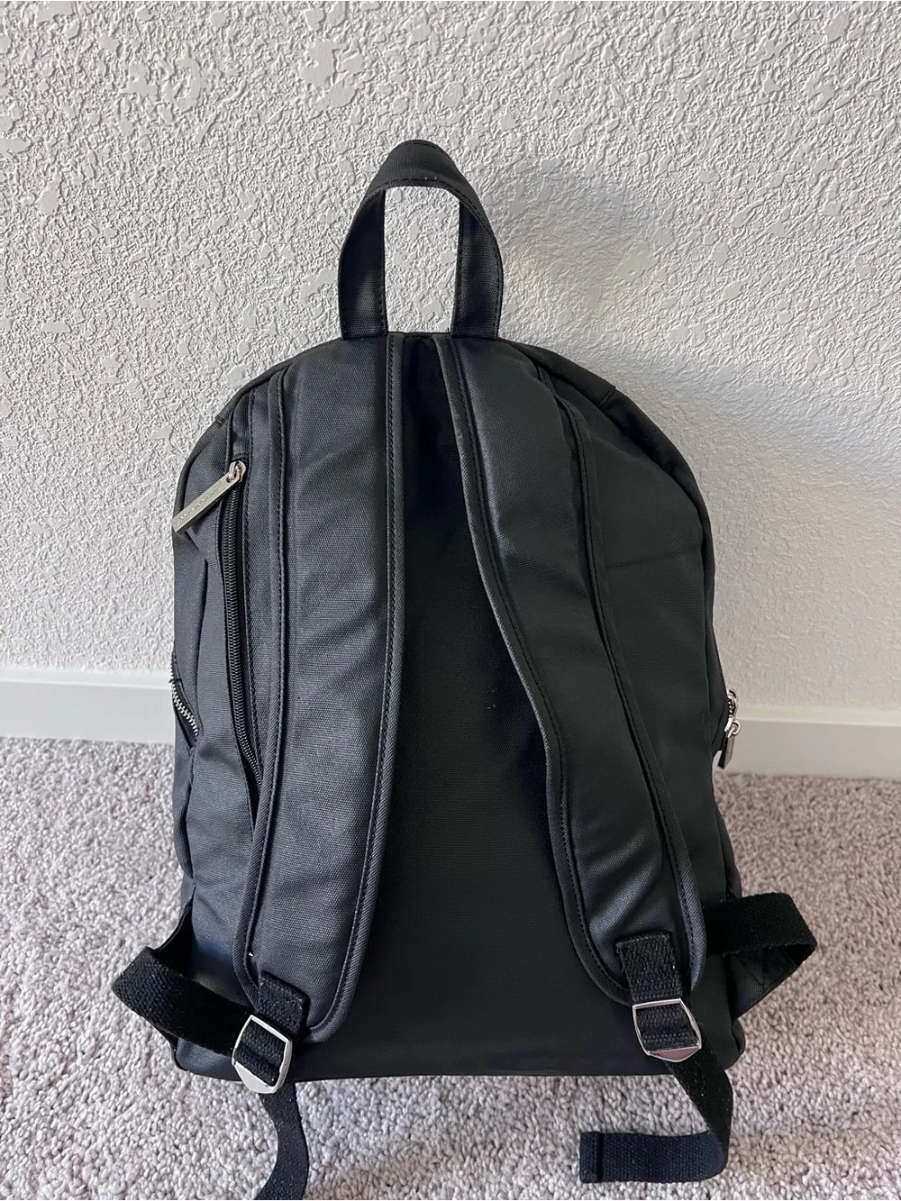 Black diaper backpack by The Honest Company